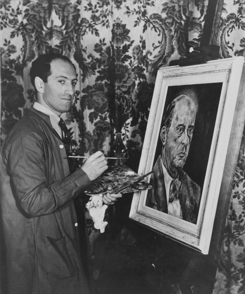 George Gershwin painting the portrait of fellow composer Arnold Schoenberg, 1936. Photo by Gabriel Hackett/Archive Photos/Getty Images.
